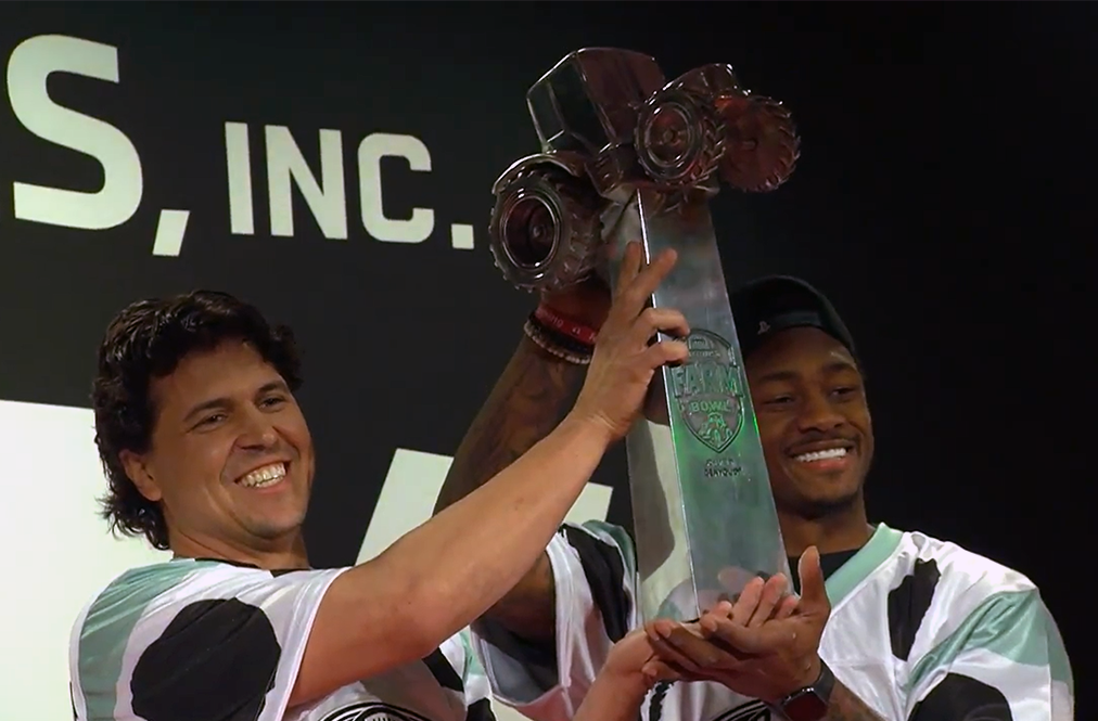 Stefon Diggs Holding The Farm Bowl Trophy